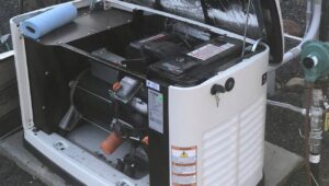 Close-up view of an open Generac generator during maintenance or installation by J C Electric & Solar in Lewiston, ID