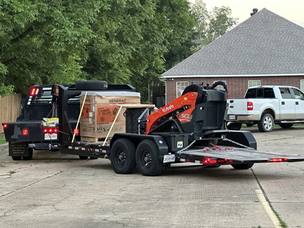 Generac generators being delivered on a flatbed trailer for installation by Cenla Generators in Alexandria, LA.