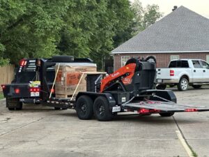 Generac generators being delivered on a flatbed trailer for installation by Cenla Generators in Alexandria, LA.