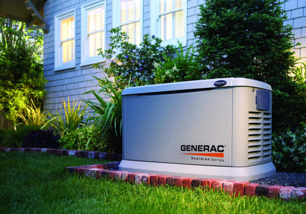 A Generac home standby generator installed outside a house, representing services by APEX Electrical Design in Fort Worth, TX