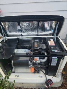 An open Generac home standby generator being serviced by Right Electrical Services LLC in Raleigh, NC.