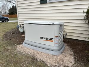 A Generac standby generator professionally installed outside a home by Ardent Electric in Erie, PA.