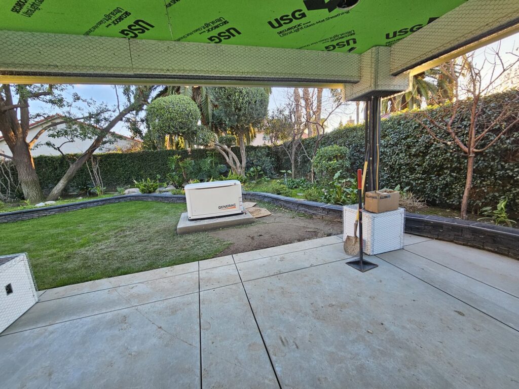 A Generac standby generator installed on a concrete pad by B&C Electric LLC in Bakersfield, CA
