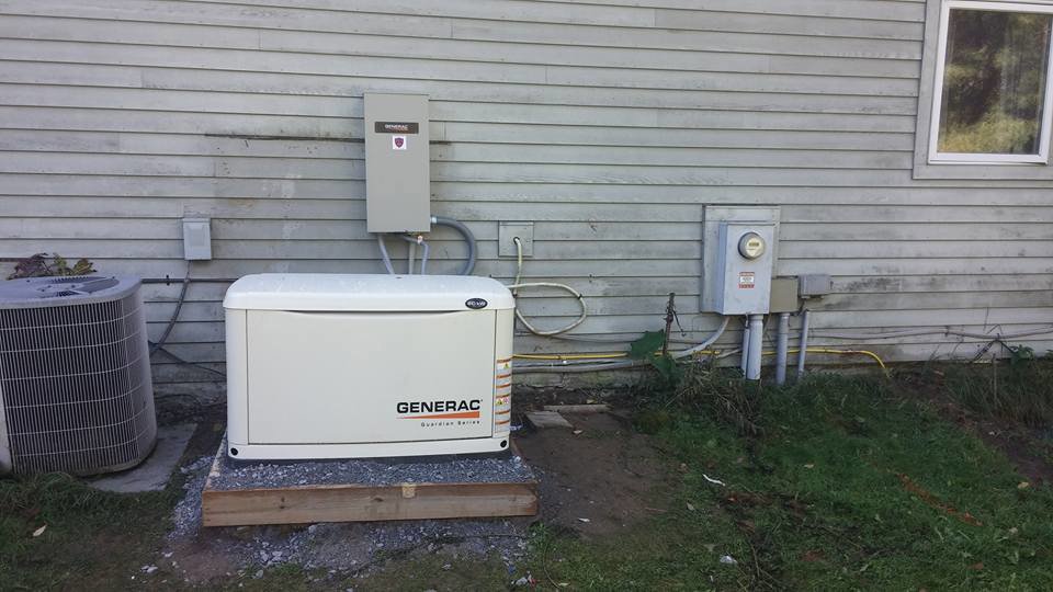 A Generac standby generator professionally installed next to a home by Dragons Electric in Schenectady, NY
