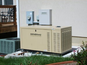 An outdoor Generac standby generator installation with electrical connections by Midway Electric in Columbia, MO