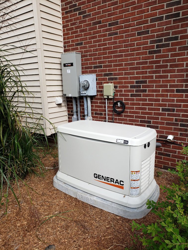 A newly installed Generac standby generator with electrical connections by Morris Electric Co. Inc. in Louisville, KY.