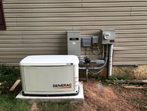 A Generac standby generator installation with electrical connections outside a home by Next Level Pros in Lakewood, CO.