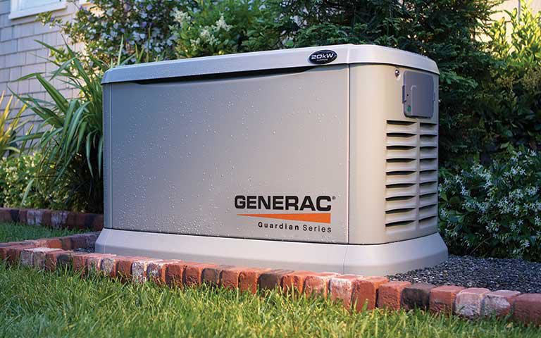 A Generac Guardian Series 20kW standby generator installed outside a home by Power Management by Steve Houtwed in Ruskin, NE.
