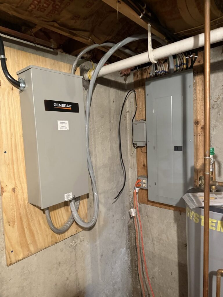 An indoor Generac transfer switch and electrical panel installed by Rockys electric in La Junta, CO.