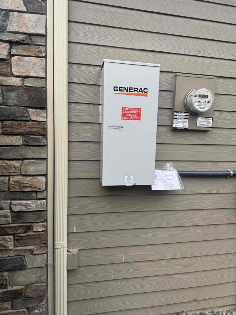 A Generac emergency disconnect service transfer switch installed by Washington Generators LLC in Kent, WA.