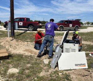 Electricians from Outlaw Home Services, LLC installing a Generac whole-home generator in San Antonio, Tx.