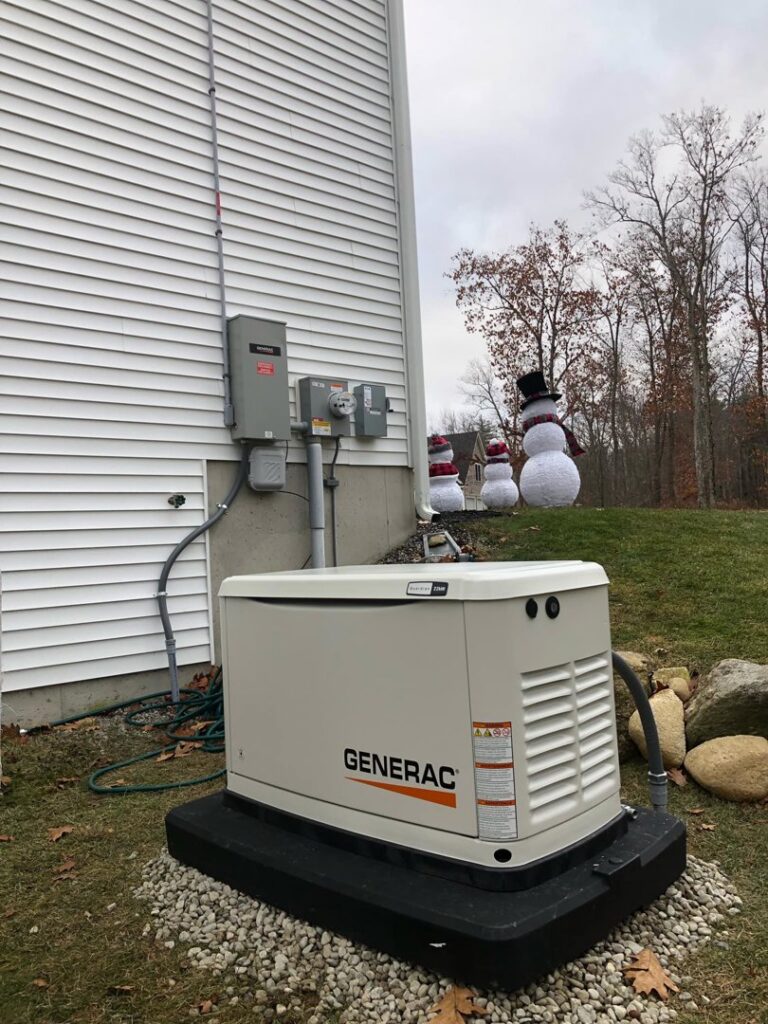A Generac whole-house generator installed outside a home by Bacon Electric, LLC in Concord, NH.