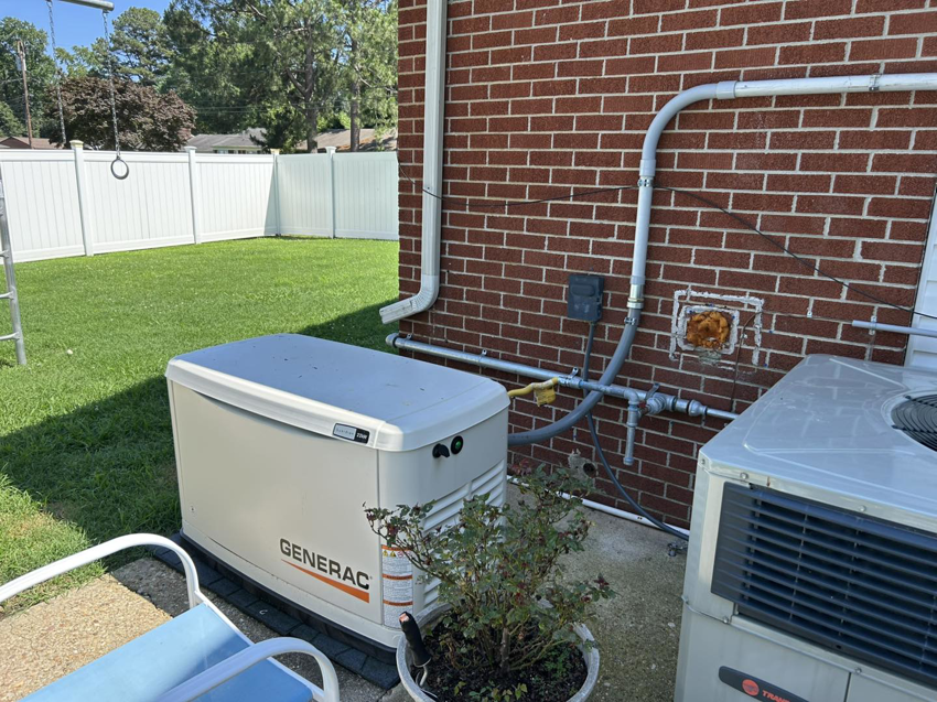 A Generac whole-house generator installed outside a home by Parks Electric & Mechanical Co. in Newport News, VA.