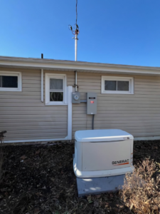 A newly installed Generac whole-house generator connected to a home's electrical system by RJ Boyd Electric in Christiansburg, VA.