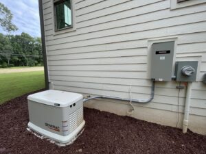 A Generac whole-house generator installed outside a residence by Royal Electric Services in Raleigh, NC