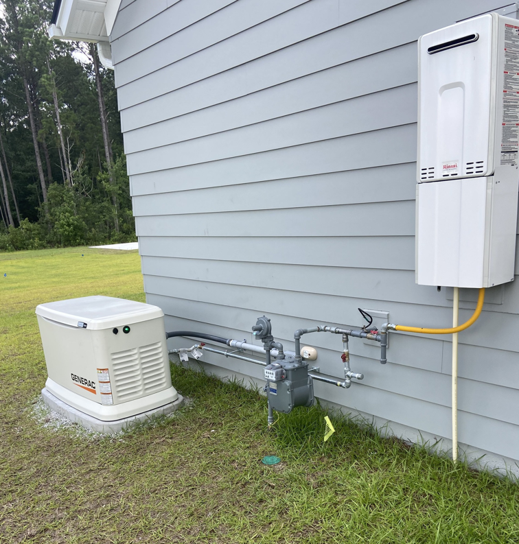 A Generac whole-house generator installation on the side of a home by Strother & Son Electric in Mount Pleasant, SC.