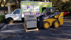 A skid steer moving a large Kohler generator for installation by Positricity in Clearwater, FL.