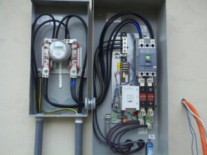 Detailed wiring inside a generator transfer switch and meter base by Ark Electrical Service in Tomball, TX