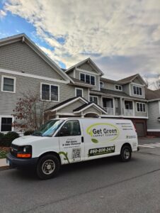 The Get Green Carpet Cleaning CT service van parked outside a residential building in West Hartford, CT.