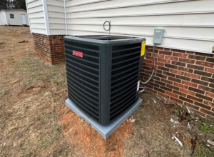 A Goodman outdoor AC unit installed at a residential property by MTZ Heating and Air Conditioning in Charlotte, NC.