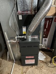 A Goodman furnace or air handler unit with new ductwork installed by CHAMPS Heating&Air in Denver, CO