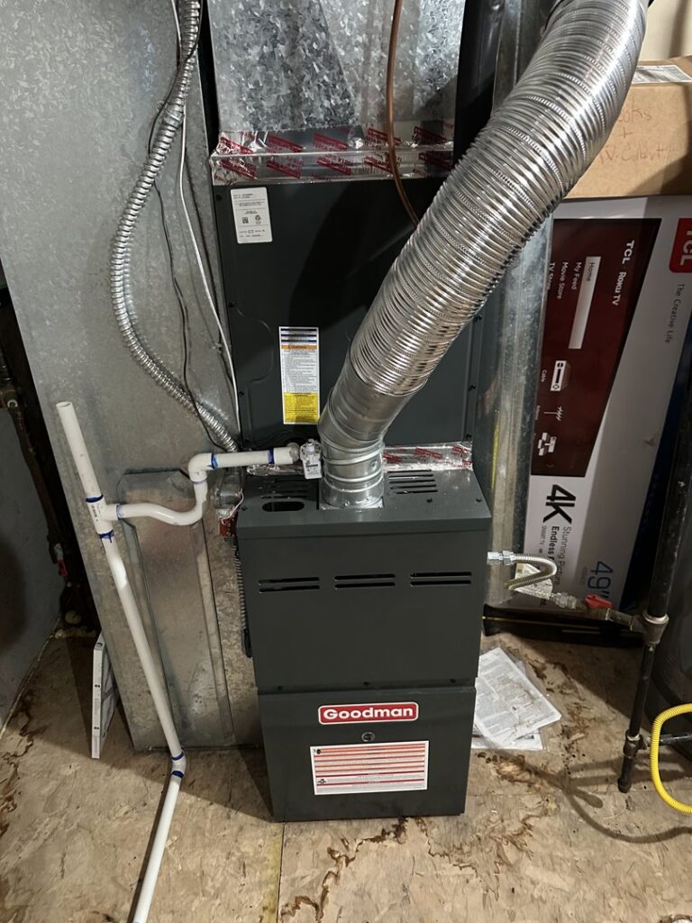 A Goodman furnace or air handler unit with new ductwork installed by CHAMPS Heating&Air in Denver, CO