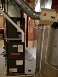 A Goodman furnace with an attached humidifier installed by Debbie's Heating and Cooling in South Bend, IN.
