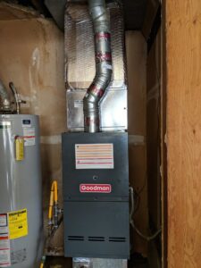 A newly installed Goodman furnace and air handler unit by Goodpaster's Mechanical, Inc. in Broken Arrow, OK.