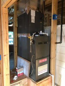 A Goodman furnace and air handler unit being installed in a residential home by Griffin's Heating & Air in Tulsa, OK.