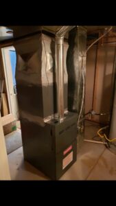 A new Goodman furnace and ductwork installed in a basement by Thin Air Heating and Cooling in Arvada, CO.