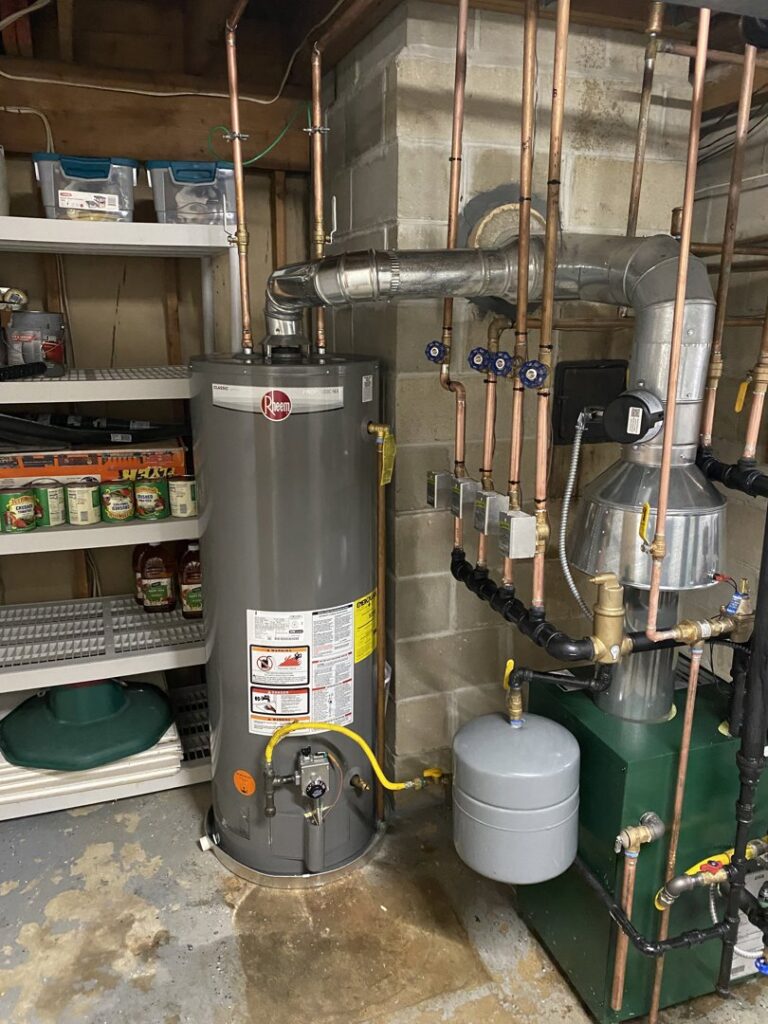 A Goodman furnace and water heater installation by Riccardi Heating and Air, an HVAC contractor in Toms River, NJ.
