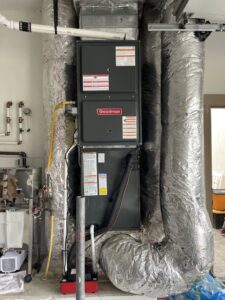 A new Goodman HVAC furnace and air handler system with ductwork installed by AC Heating & Cooling in Meridian, ID.