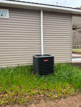 A Goodman HVAC unit installed outside a commercial or residential building by SJ Conner and Sons Inc in Roanoke, VA