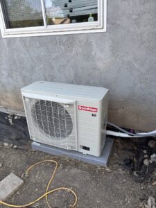 An outdoor Goodman mini-split condenser unit professionally installed by LUCAS Heating And Air LLC in Salt Lake City, UT.