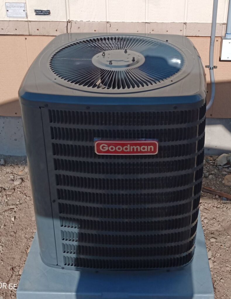 A newly installed Goodman outdoor air conditioning unit by 307 HVAC Services in Rock Springs, WY.