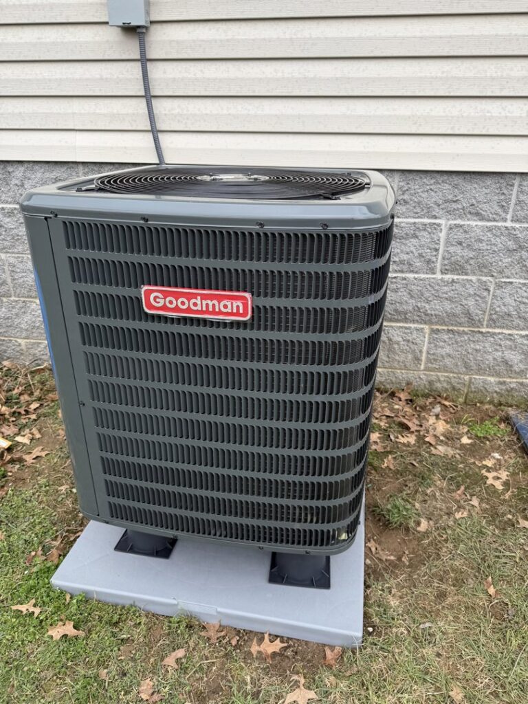 A newly installed Goodman outdoor air conditioning unit by C&L Heating and Air in Louisville, KY.