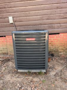 A Goodman outdoor air conditioning unit professionally installed by Johnson's A/C & Heating in Alexandria, LA.