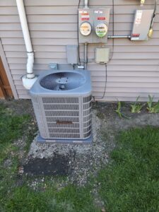 A newly installed Goodman outdoor air conditioning unit by Nordic Air Heating & Cooling in West Allis, WI.