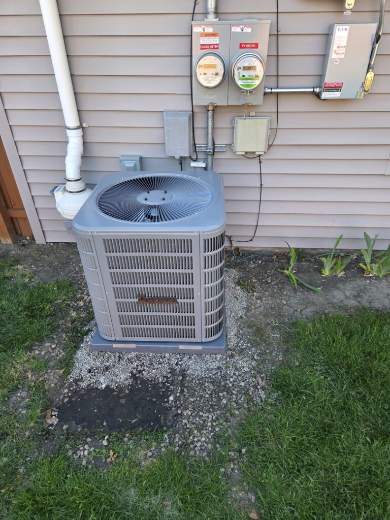 A newly installed Goodman outdoor air conditioning unit by Nordic Air Heating & Cooling in West Allis, WI.