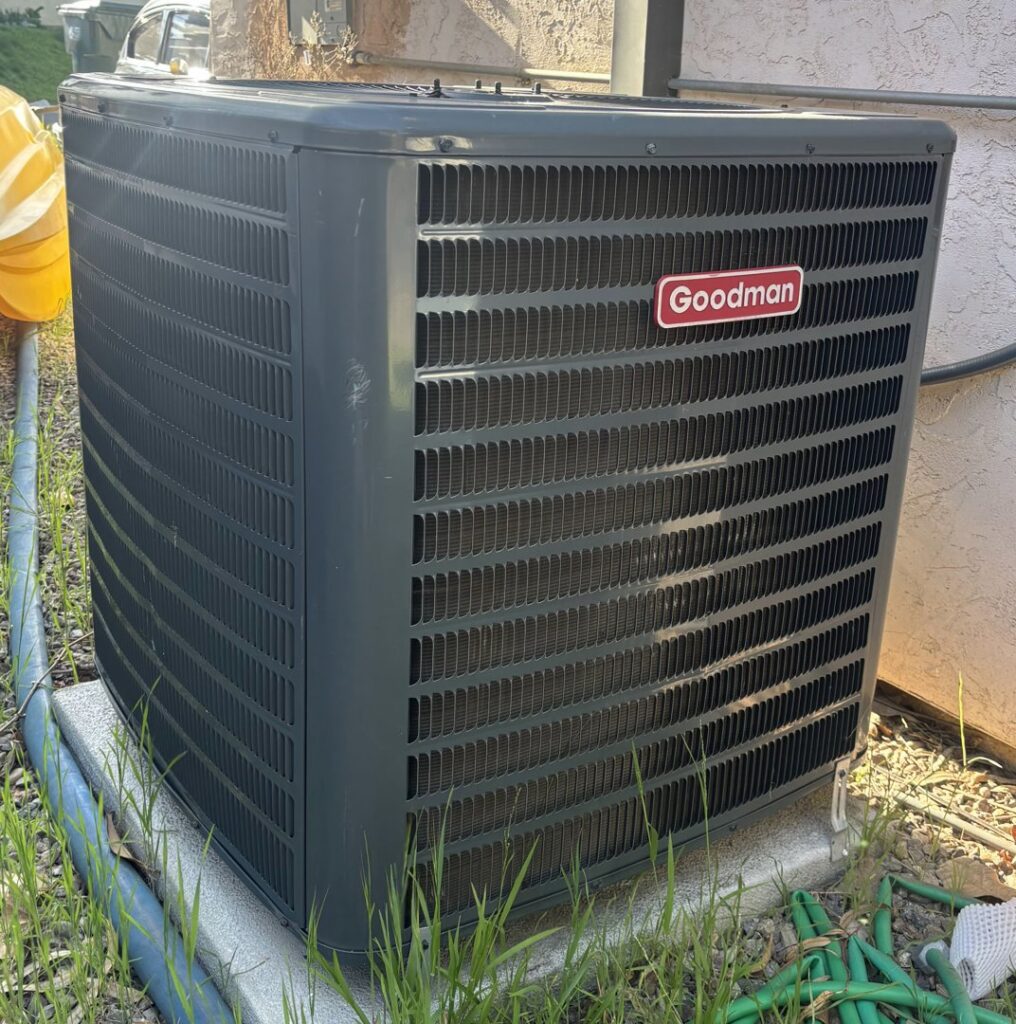 A Goodman brand outdoor HVAC condenser unit installed by That HVAC Guy in San Diego, CA