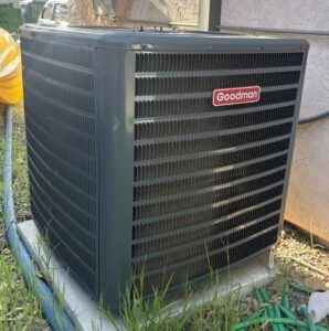 A Goodman brand outdoor HVAC condenser unit installed by That HVAC Guy in San Diego, CA