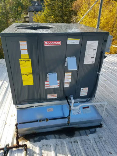 A Goodman rooftop HVAC unit installed on a commercial building by AP HVAC in Ridgewood, NY.