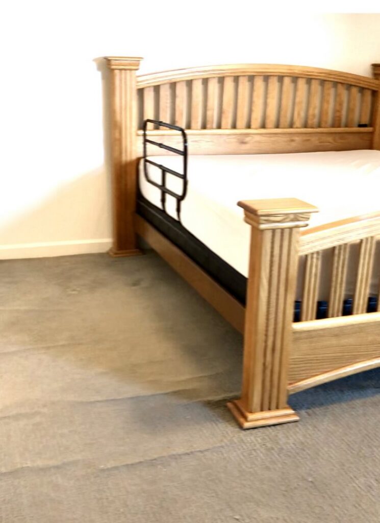 Close-up of a newly installed gray carpet in a bedroom by The Flooring Outfit, a carpet contractor in Mesa, AZ.