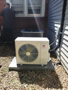 An outdoor Gree mini-split condenser unit installed by Vega Heating and Cooling in Kansas City, KS