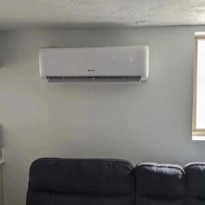 A Gree mini-split indoor unit installed in a living room by Inspector Rogers LLC in Draper, UT.