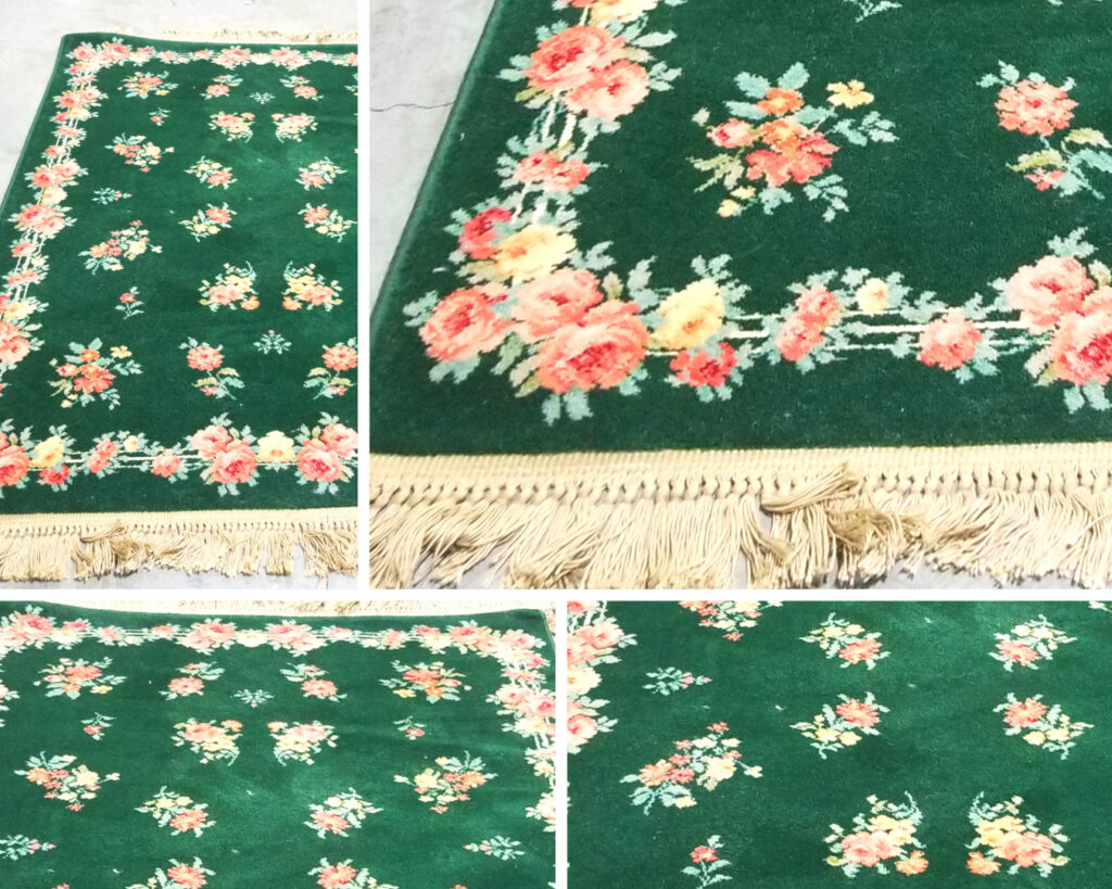 A beautiful green rug adorned with intricate floral patterns and fringe, showcasing the quality of rugs serviced by N J Green Rug Cleaning in Jersey City, NJ.