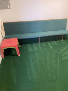 Professional cleaning of a green room carpet by M3 Cleaning Solutions, LLC in Montgomery, AL.