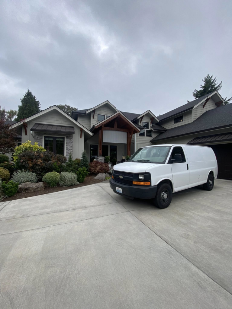 Greener Carpet Cleaning van parked outside a residential home in Vancouver, WA.