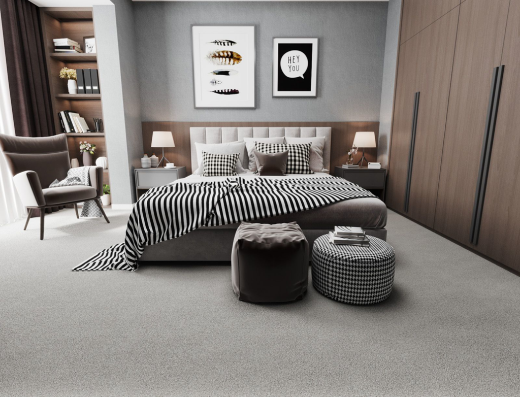 Elegant grey carpet professionally installed in a bedroom by Son Shine Floor Covering LTD, your local contractor in Warren, MI.