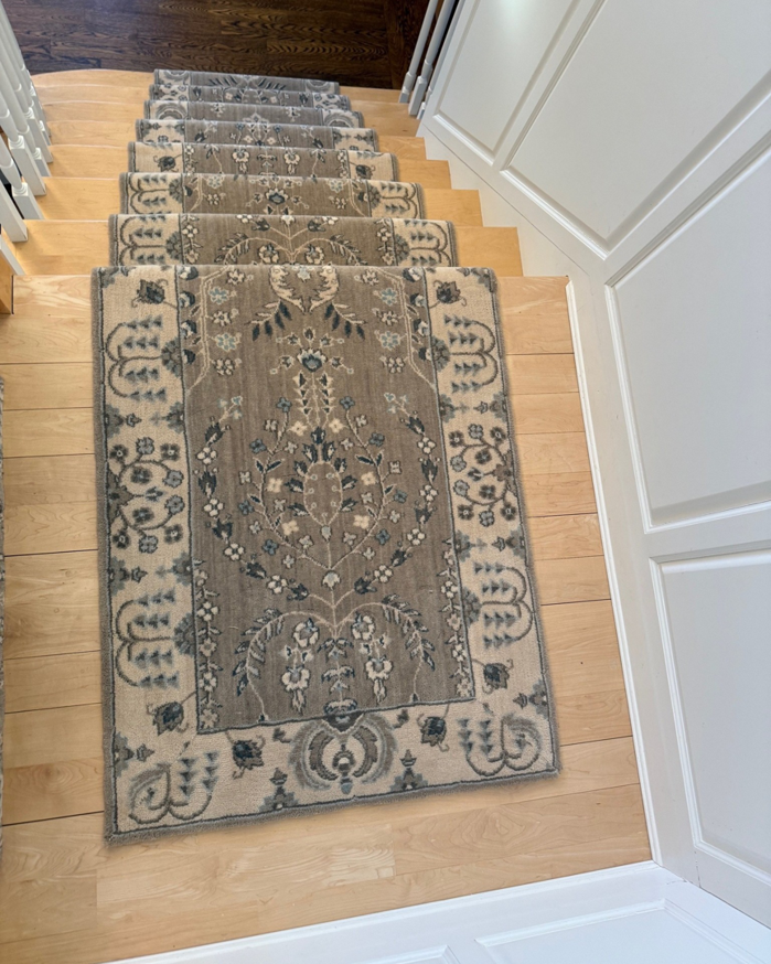 A stylish grey and beige patterned stair runner installed by Kaoud Rugs in West Hartford, CT